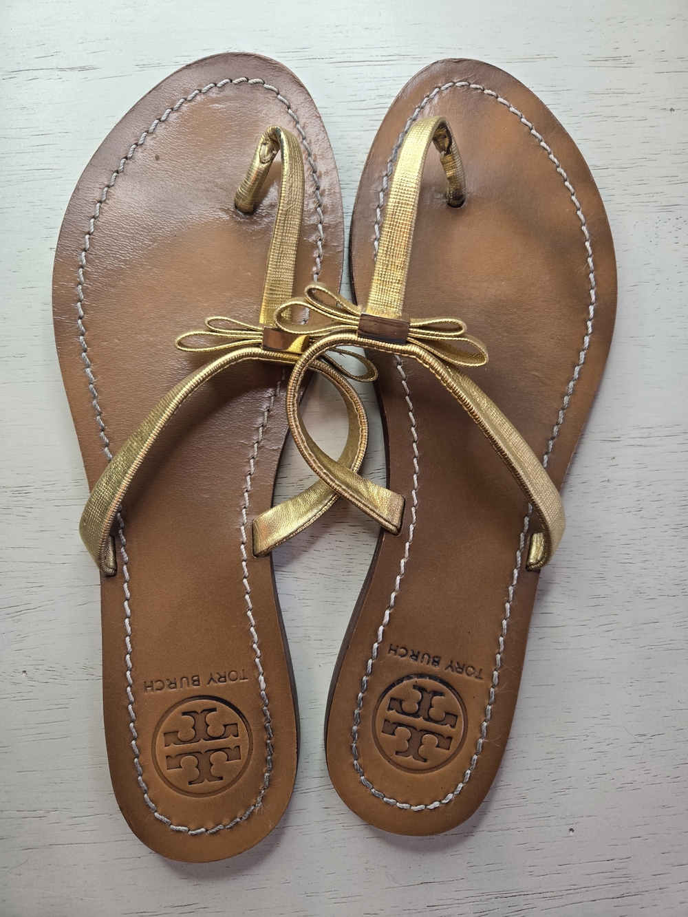 Tory Burch Gold Bow Leather Thong Sandals